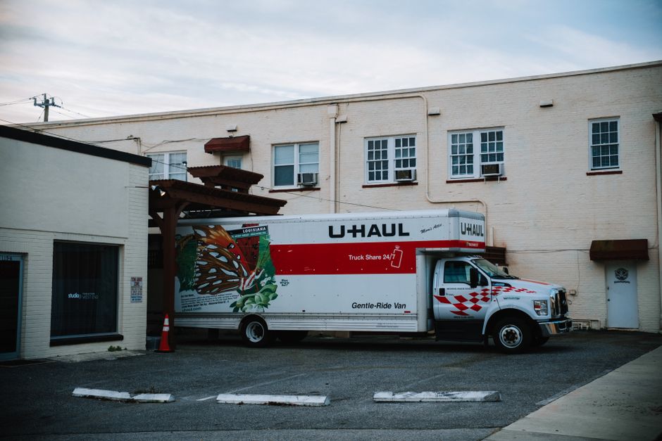Movers loading a large moving truck