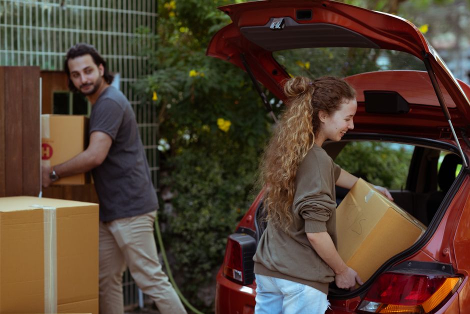Happy family moving into their new residential home